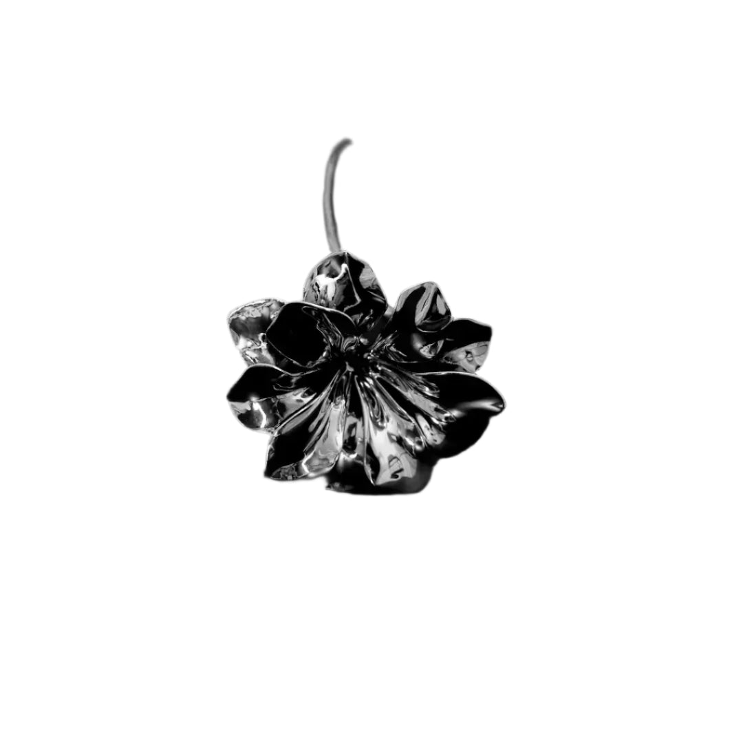 Futuristic chrome flower sculpture with fluid 3D petals – metallic botanical design in minimalist stem form