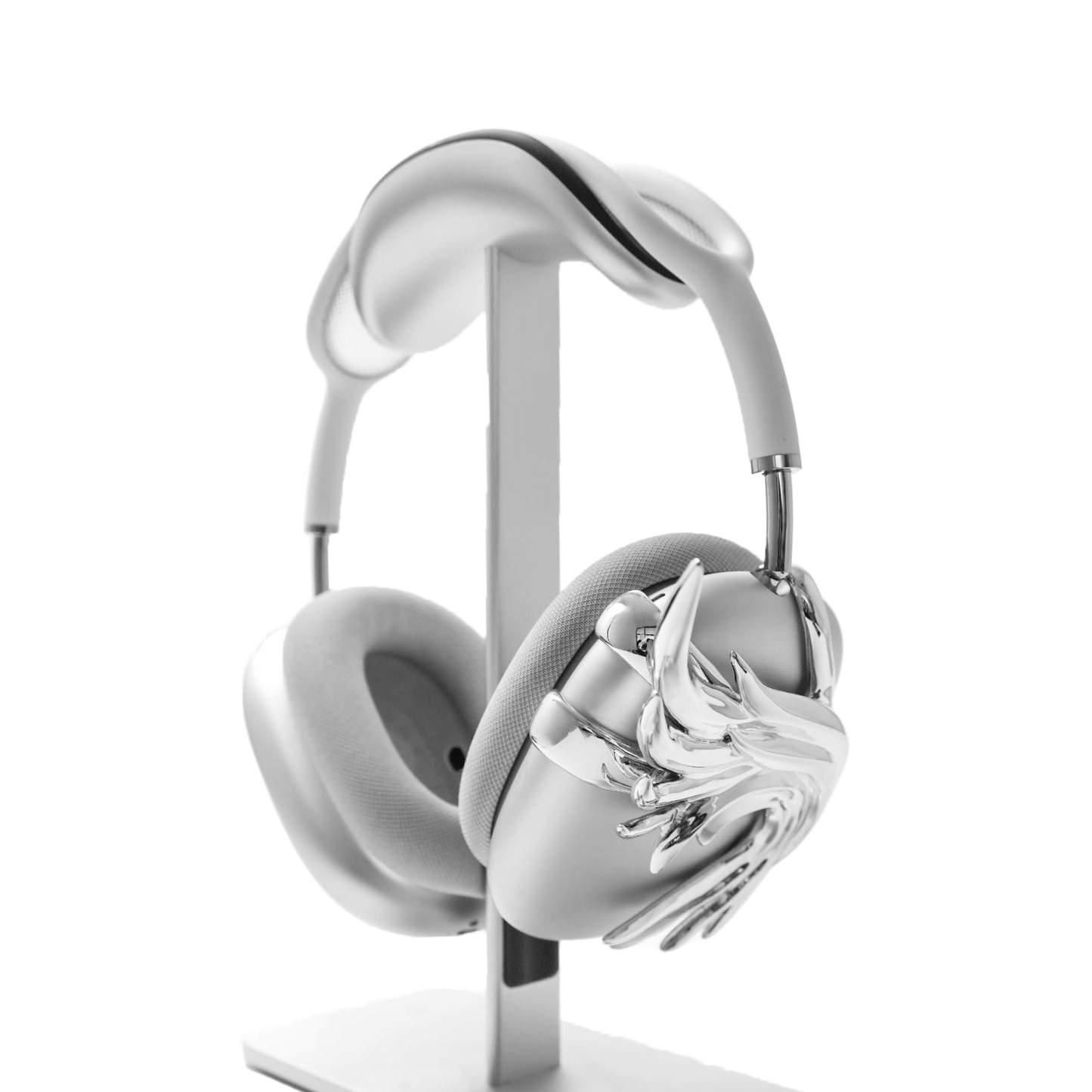 A sculptural 3D attachment for AirPods Max headphones featuring unique, upward-curled angel wings with layered feather details. Available in two finishes: Reflective Silver Chrome and Matte Ethereal White. Shown in both single ear cup and symmetrical pair configurations.