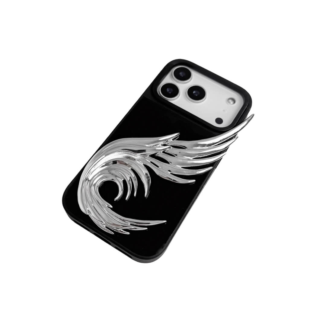 The Curl Silver Angel Wing iPhone Case featuring a 3D sculpted silver metallic wing with a unique upward-curled silhouette and high-shine chrome finish. Shown in three base variations: Silver, Transparent, and Black.
