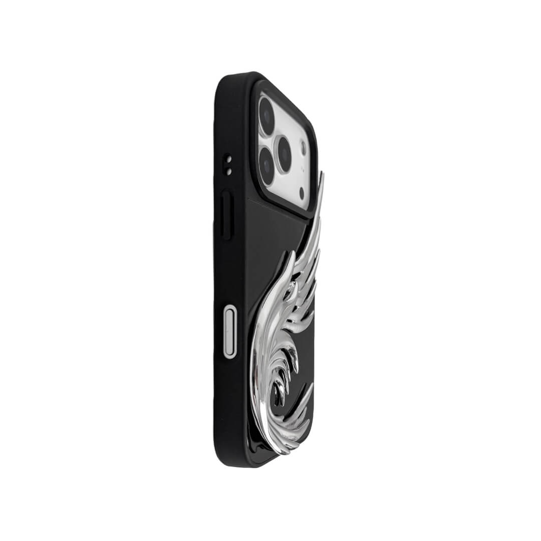 The Curl Silver Angel Wing iPhone Case featuring a 3D sculpted silver metallic wing with a unique upward-curled silhouette and high-shine chrome finish. Shown in three base variations: Silver, Transparent, and Black.