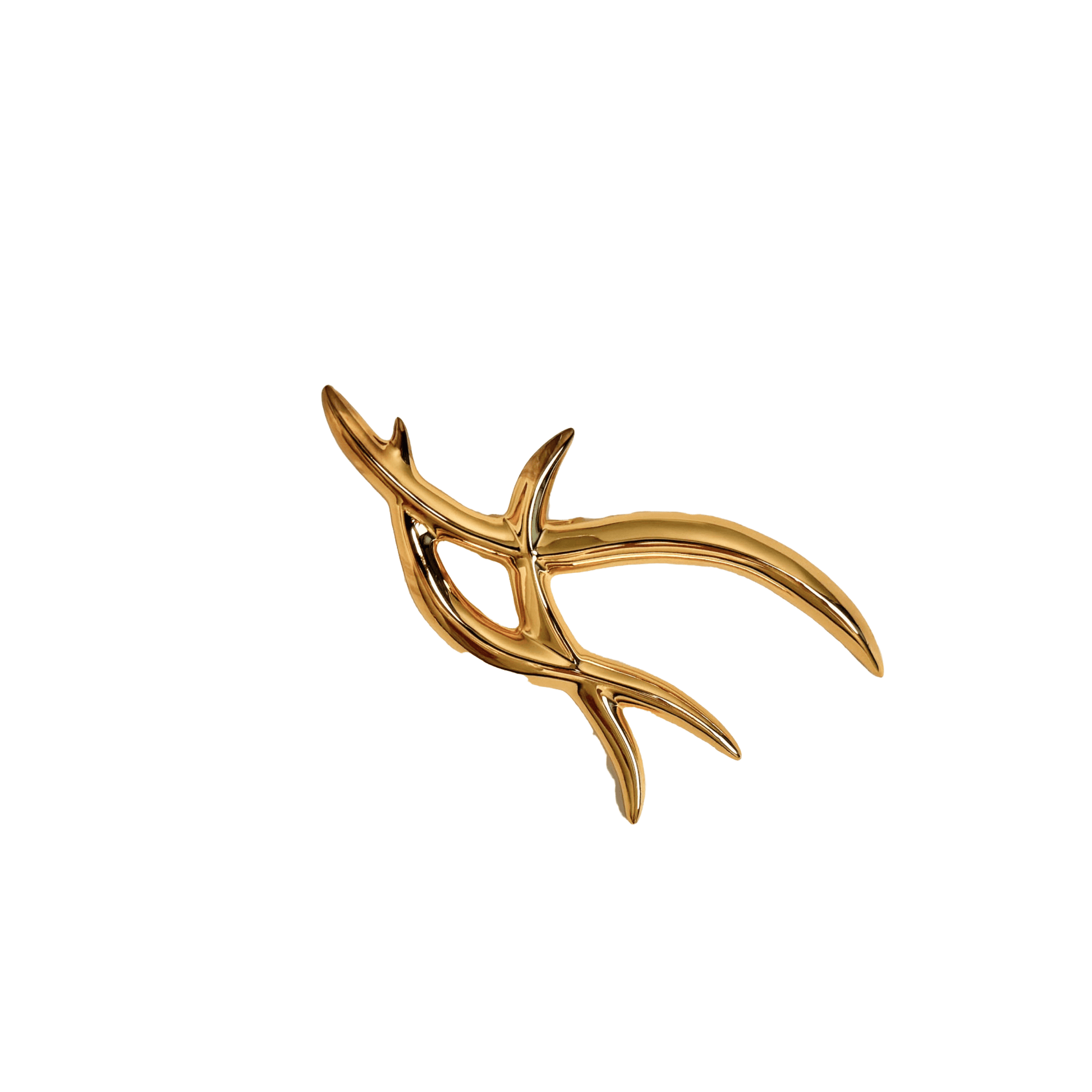 The XTENDED iDENTiTY "Cyber Dreams" Shoelry from the Cyber Dream series. A single-piece ornament featuring a fluid, abstract metallic design resembling a sharp, futuristic letter or symbol. Available finishes include Shadow Black, Liquid Silver, and Molten Gold, displayed together.