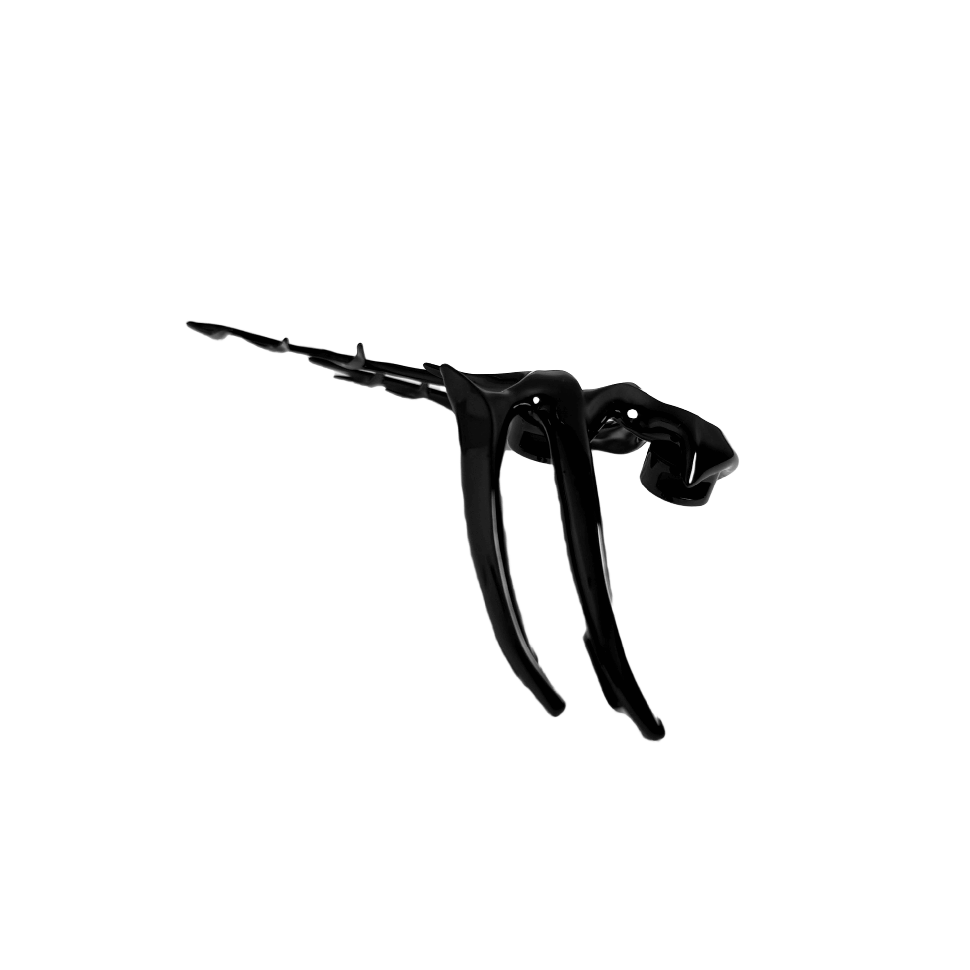 The XTENDED iDENTiTY "Cyber Fin" Shoelry from the Cyber Dream series. A highly detailed, segmented ornament resembling a futuristic mechanical fin with sharp, flowing lines. Available finishes include Shadow Black, Liquid Silver, and Molten Gold, displayed together.