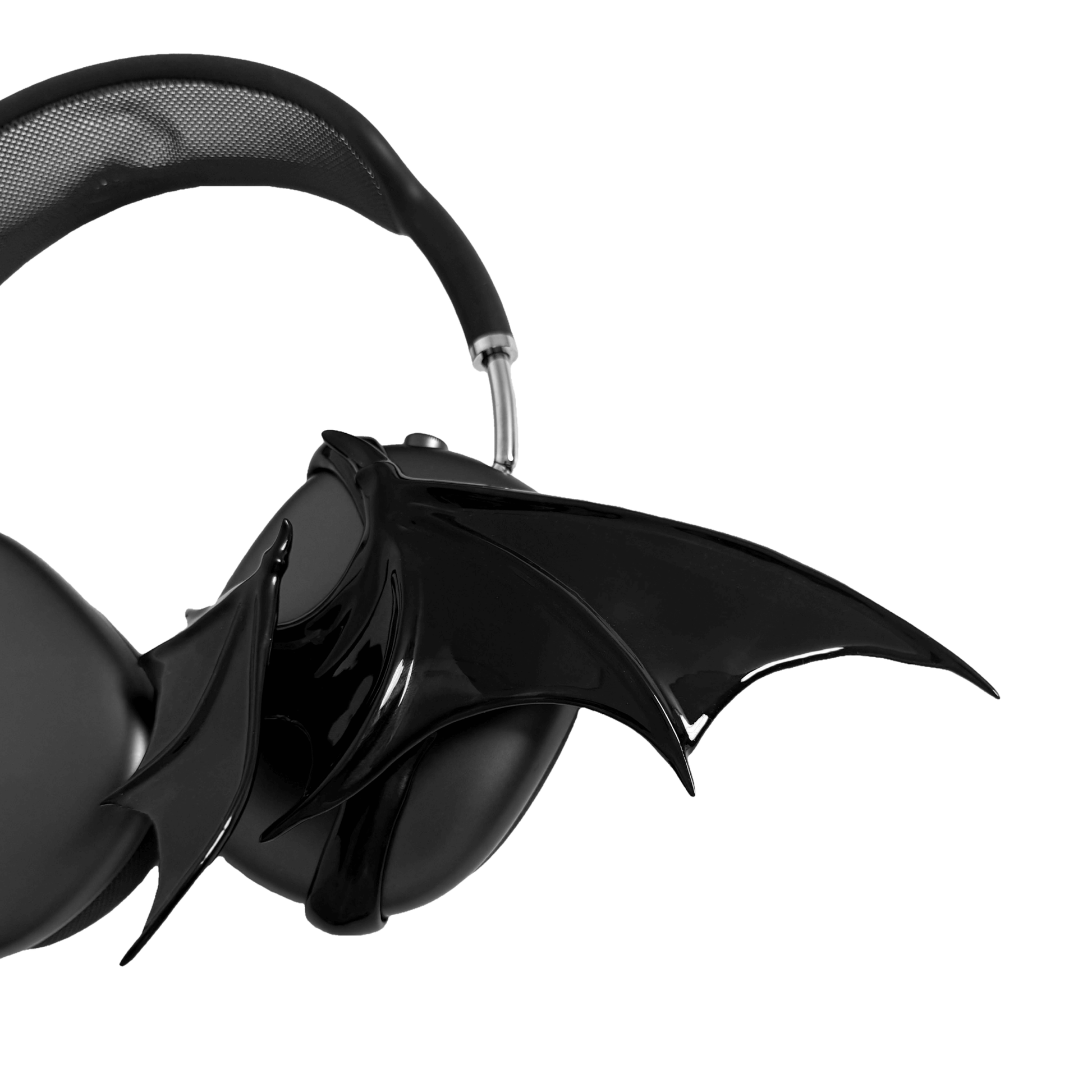A high-fashion 3D attachment for AirPods Max headphones featuring sharp, sculpted demon wings. Available in two finishes: a high-shine Reflective Silver Chrome and a sleek Obsidian Black. The design is shown as both a single asymmetrical attachment and a symmetrical pair wrapping around the headphone ear cups.