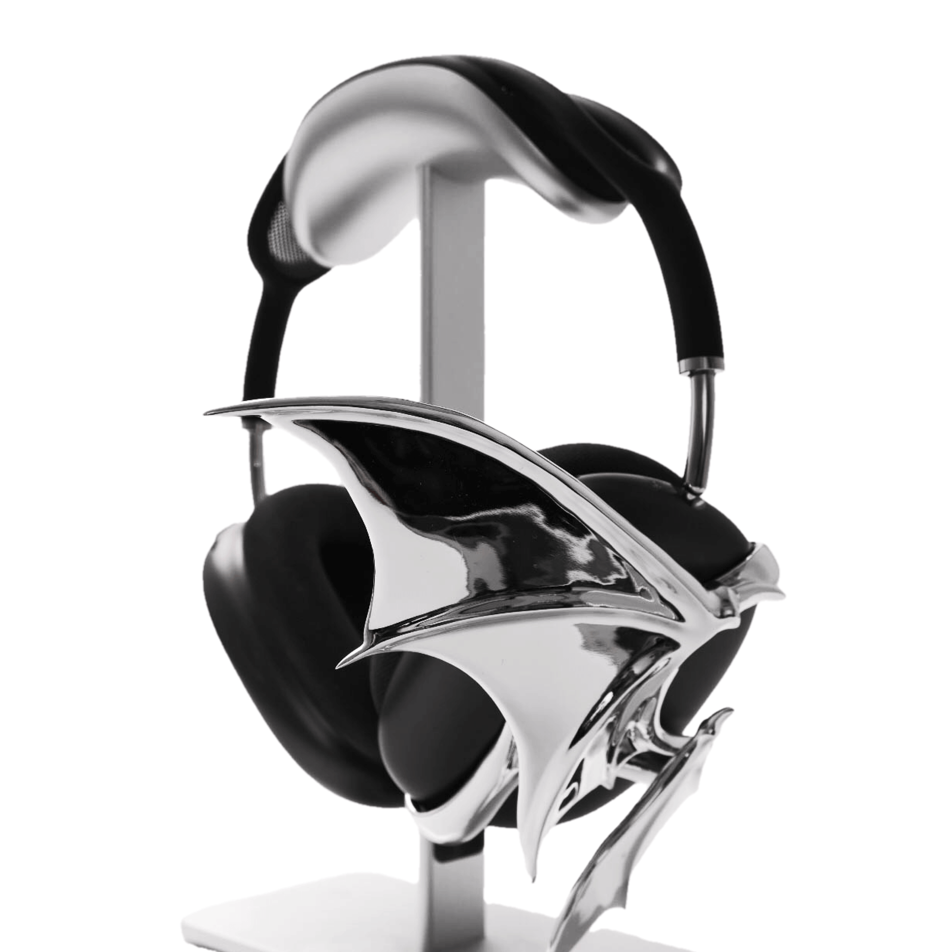 A high-fashion 3D attachment for AirPods Max headphones featuring sharp, sculpted demon wings. Available in two finishes: a high-shine Reflective Silver Chrome and a sleek Obsidian Black. The design is shown as both a single asymmetrical attachment and a symmetrical pair wrapping around the headphone ear cups.