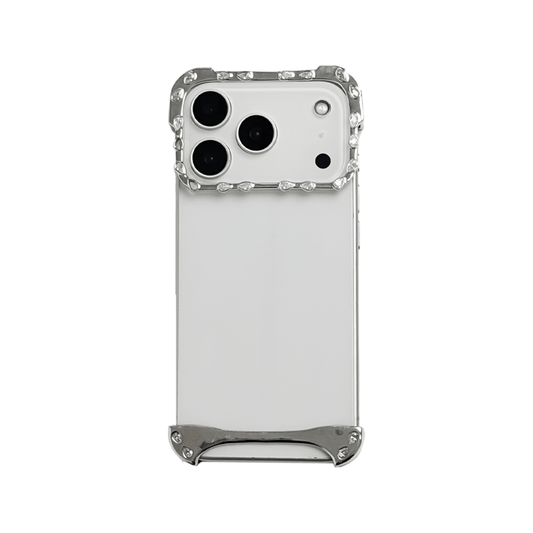 iPhone case with segmented silver chrome frame and embedded crystal studs, creating a minimalist, jewelry-inspired protective design.