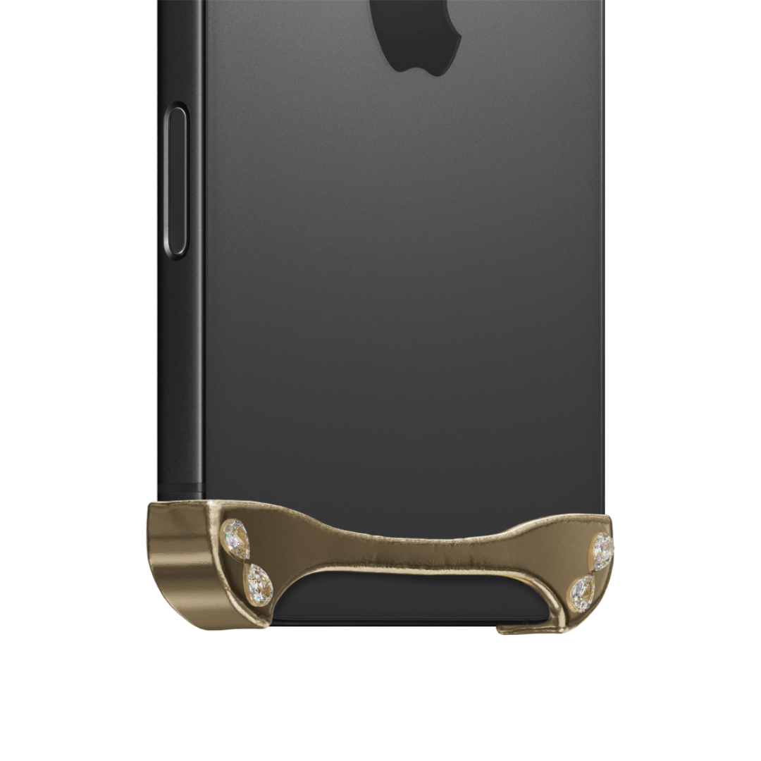 iPhone case with segmented silver chrome frame and embedded crystal studs, creating a minimalist, jewelry-inspired protective design.