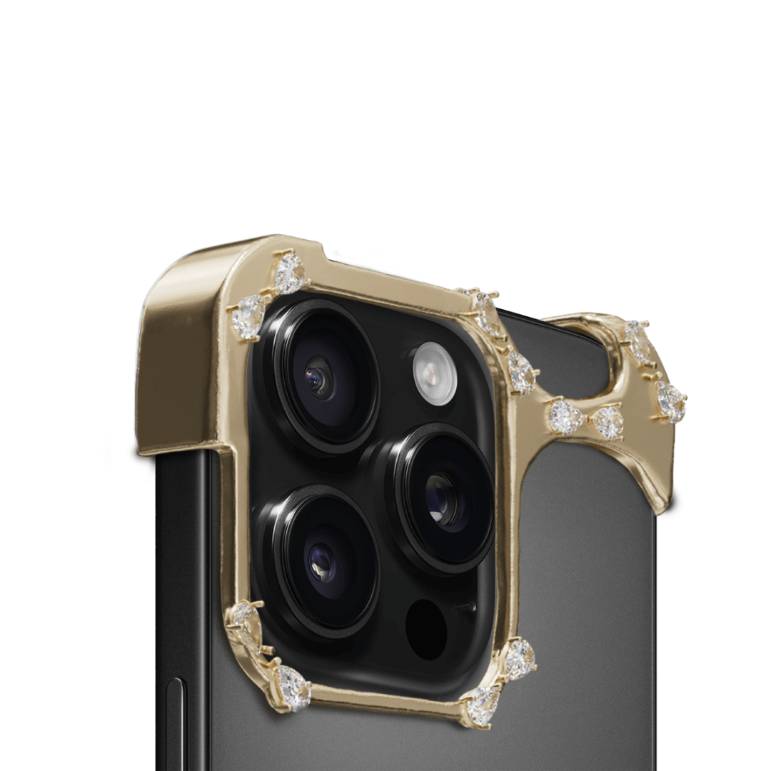 iPhone case with segmented silver chrome frame and embedded crystal studs, creating a minimalist, jewelry-inspired protective design.
