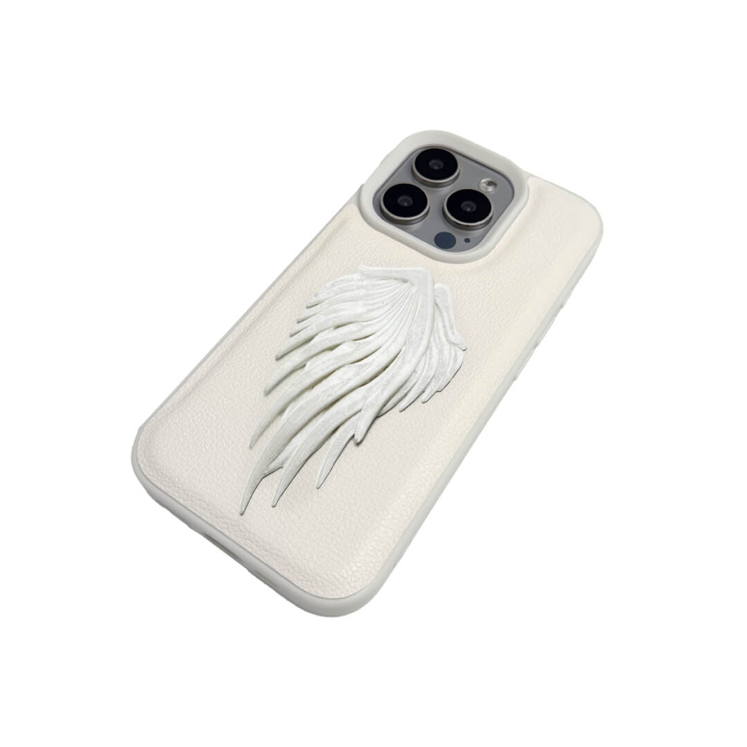 The Embroidered Double Wings iPhone Case featuring symmetrical white feathered wing embroidery and a shimmering central accent, shown on both the Crystal Clear (Transparent) and White Leather Texture base options.