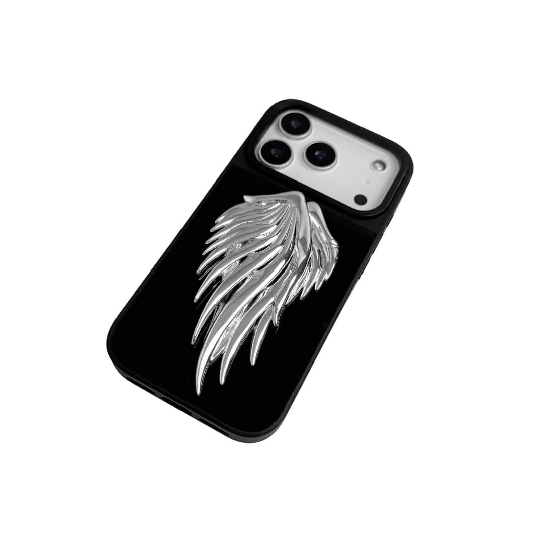 The Double Silver Angel Wings iPhone Case featuring a pair of symmetrical, 3D sculpted silver metallic wings with a high-shine chrome finish. Shown in three base variations: Silver, Transparent, and Black.