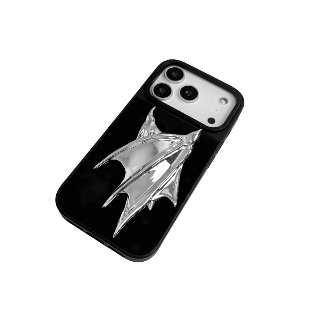 The Double Silver Demon Wings iPhone Case featuring symmetrical, sharp 3D sculpted silver metallic wings with a high-shine chrome finish. Shown in three base variations: Silver, Transparent, and Black.
