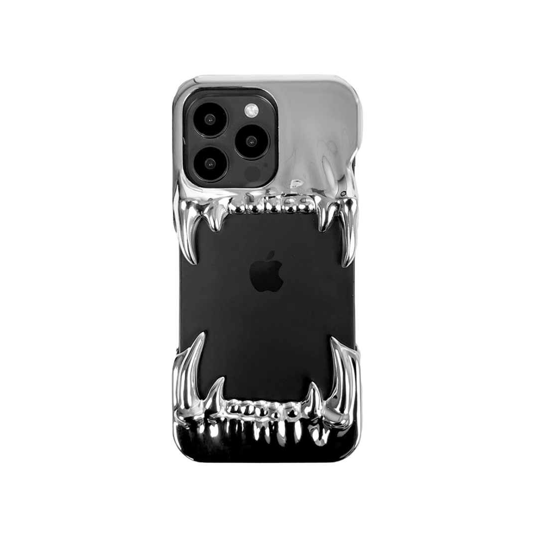 Metallic silver iPhone case with fierce dragon fang design – upper and lower jaws grip the phone edges, creating a bold, high-impact gothic aesthetic.