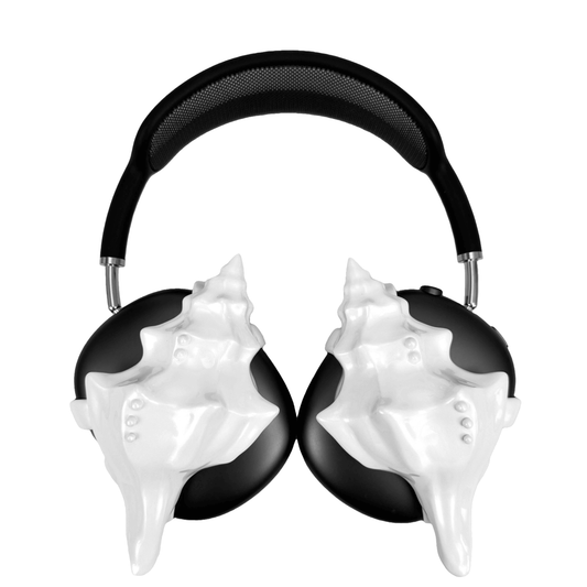 Over-ear headphones with sculptural conch shell embellishments and metallic accent dots, evoking deep-sea elegance and organic rhythm.