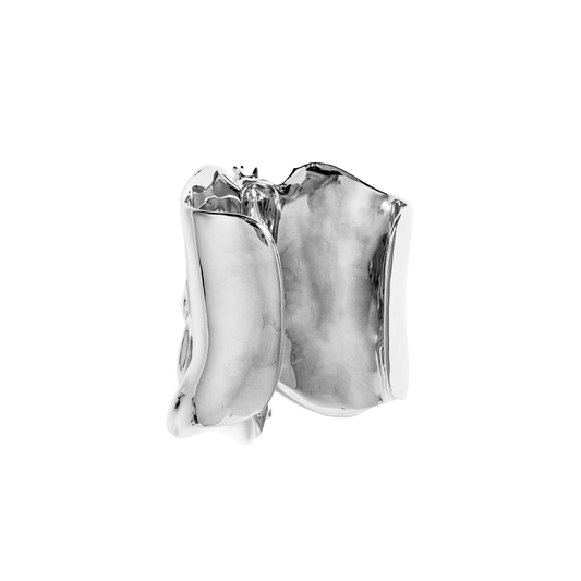 Command attention with the Gem Ribcage Cuff. Skeletal luxury meets couture gems in this red carpet-worthy arm piece.