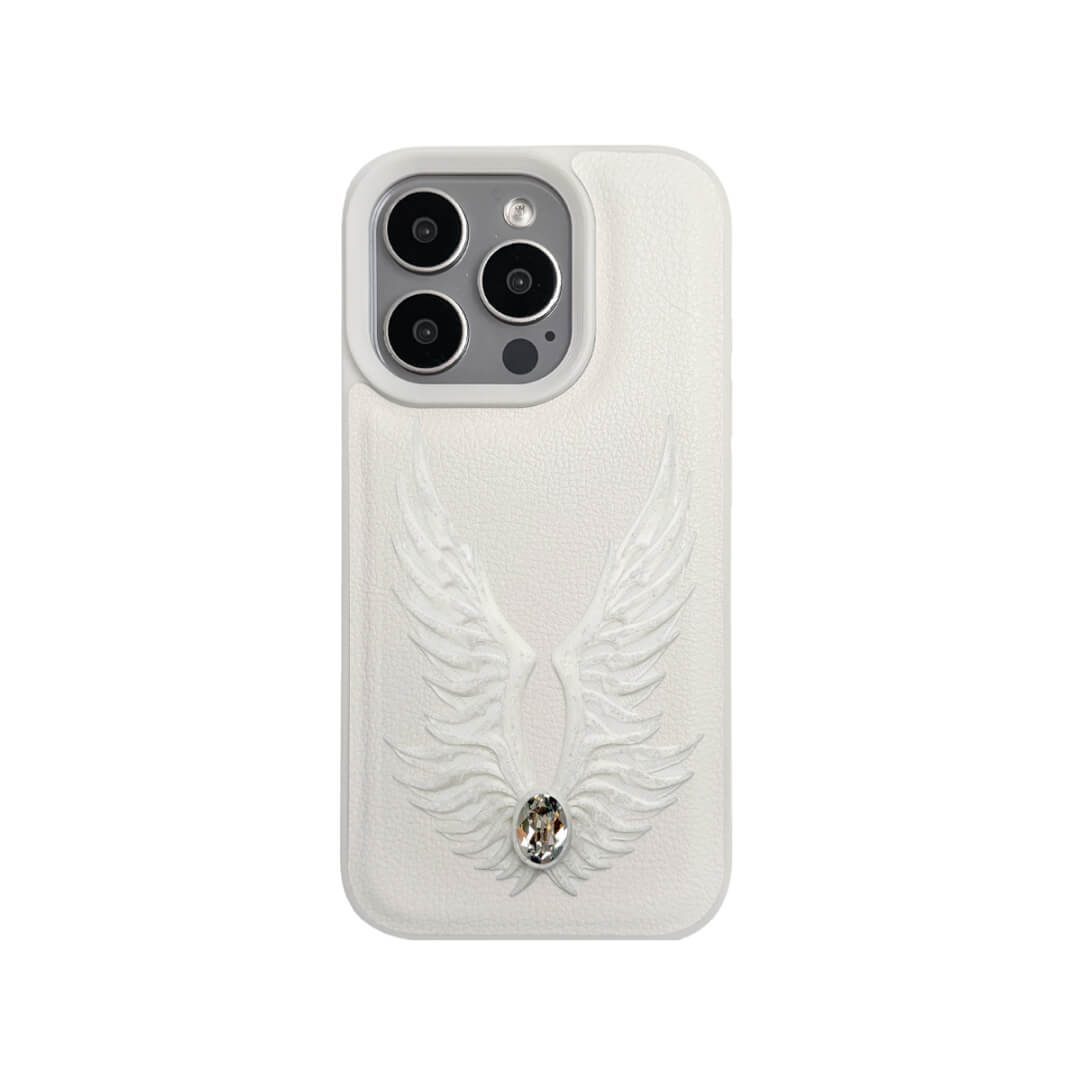 The Embroidered White Feather Wings iPhone Case featuring intricate white feather/wing embroidery and a central pearl, shown on both the Crystal Clear (Transparent) and White Leather Texture base options.