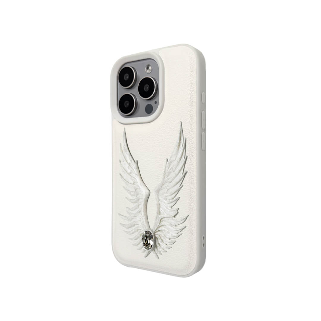 The Embroidered White Feather Wings iPhone Case featuring intricate white feather/wing embroidery and a central pearl, shown on both the Crystal Clear (Transparent) and White Leather Texture base options.