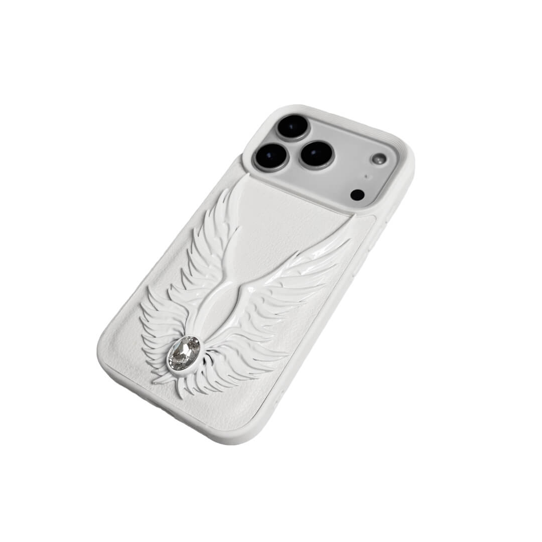 angel-wing iPhone case with sculpted wings and a central gemstone, available in transparent and white leather-textured bases.