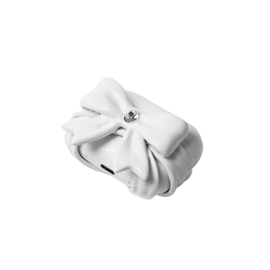 Black and white AirPods case covers featuring a sculpted 3D bow adorned with white gemstones; hard protective SLA shell designed for AirPods 4, AirPods Pro 2, and AirPods Pro 3.