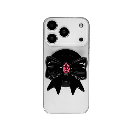Gem Ribbon Phone Grip S available in black and white ribbon designs, each featuring Swarovski crystal options: black and white with black, white, or pink gems.