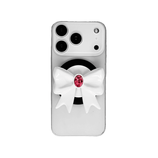 Gem Ribbon Phone Grip S available in silver, pink, black, and white ribbon designs, each featuring Swarovski crystal options: silver with pink, purple, white, blue, or black gems; pink with pink gem; black and white with black, white, or pink gems.