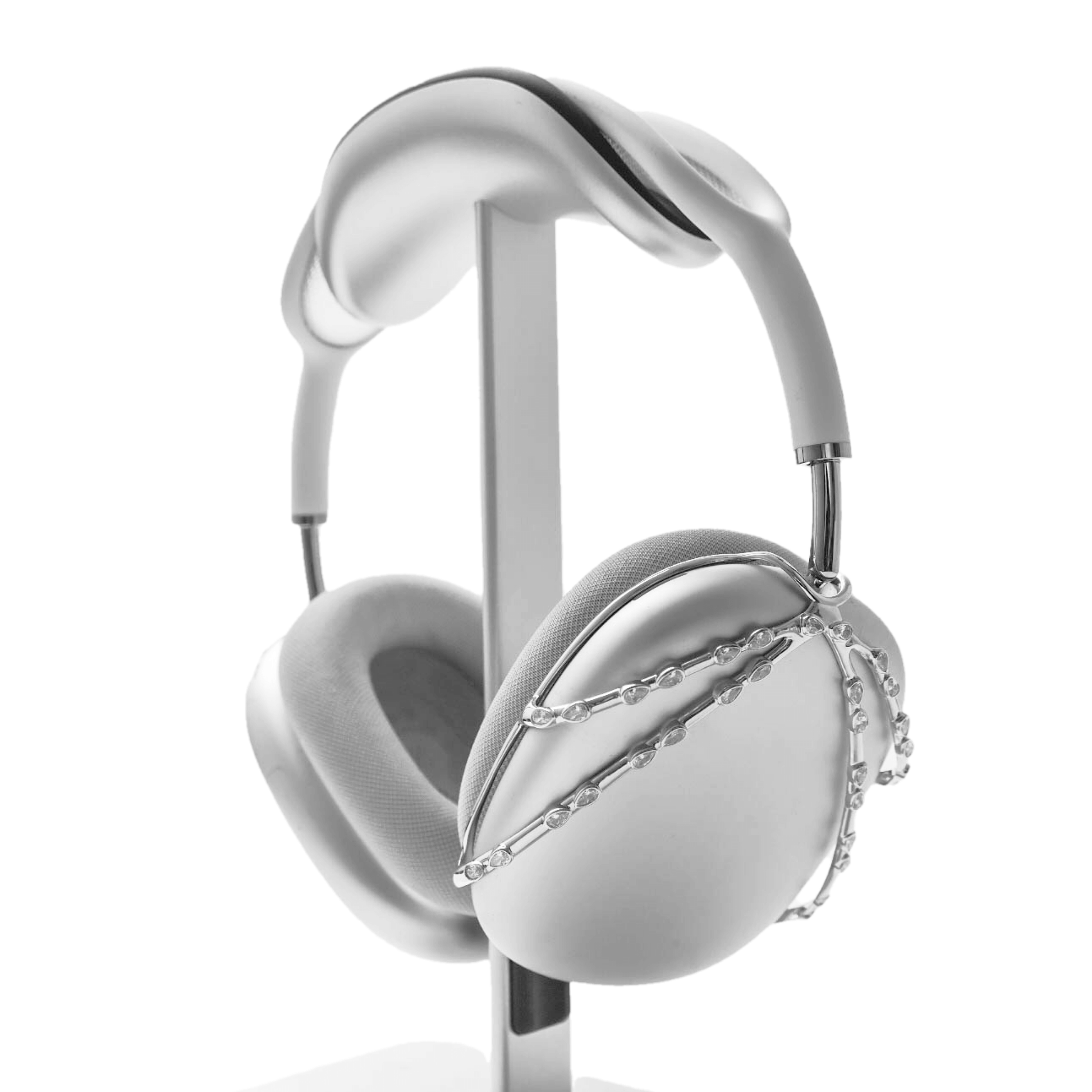 A luxury metal attachment for AirPods Max headphones featuring delicate metallic chains embedded with sparkling white crystals. The product is shown in a reflective Silver-Chrome finish, available as both a single ear cup cover and a symmetrical pair.