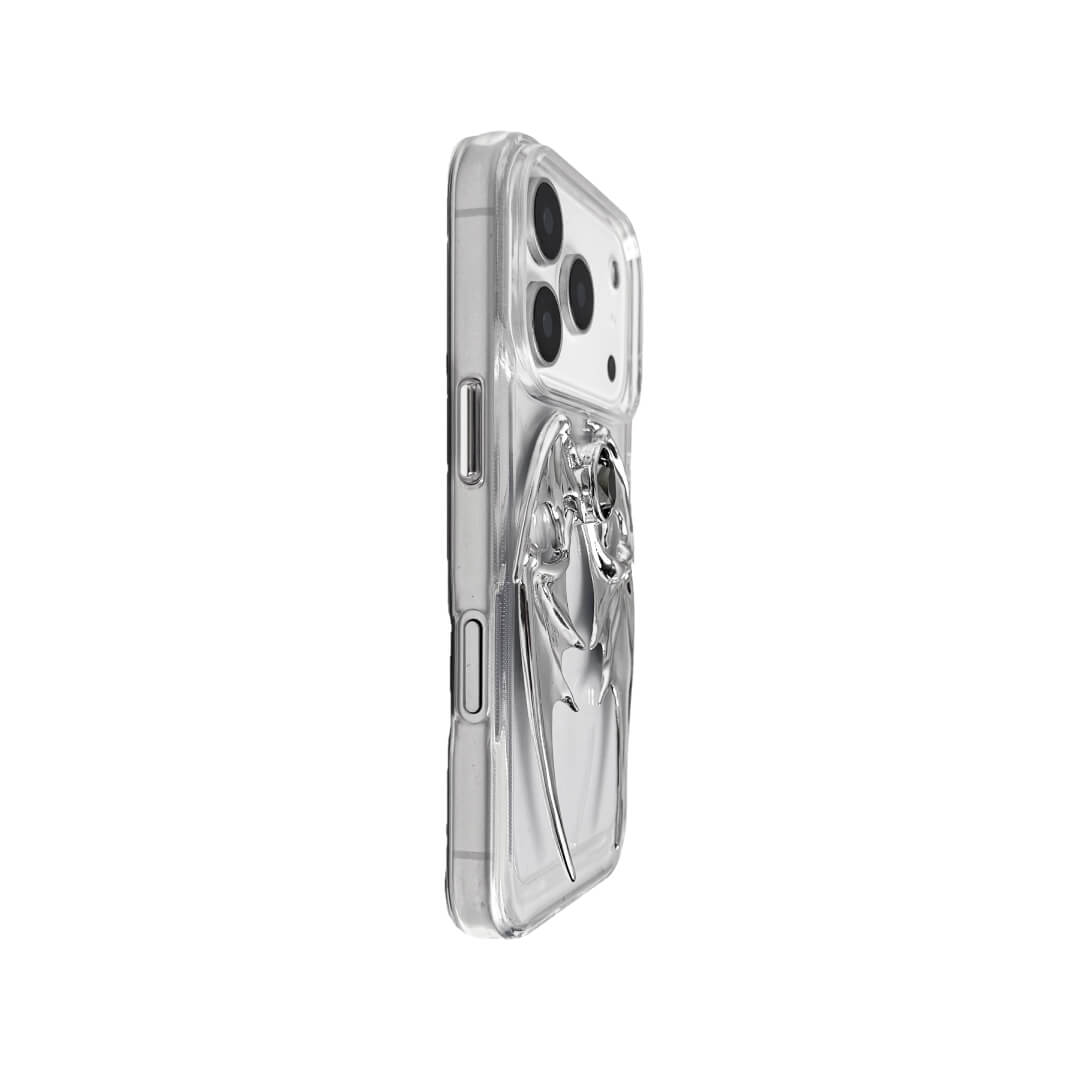 The Gem Demon Wings iPhone Case featuring 3D sculpted silver metallic bat-style wings with a central rhinestone. Shown with both White and Black gem options, available on Silver, Transparent, and Black case bases.