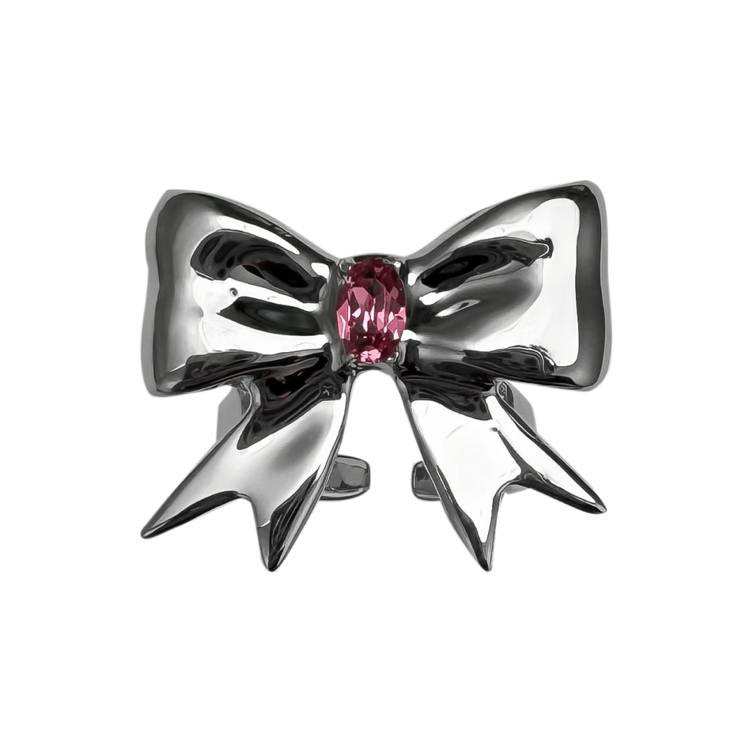 Stylish ribbon-shaped ring in silver and black with a pink Swarovski crystal accent.