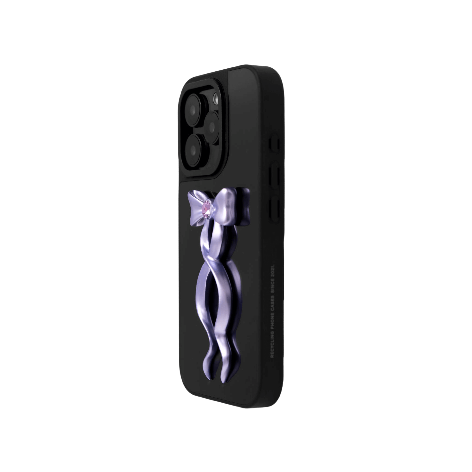 Collection of five Gem Ribbon iPhone Case XS designs, showing clear cases with 3D metallic ribbons in silver, black, white, pink, and purple.