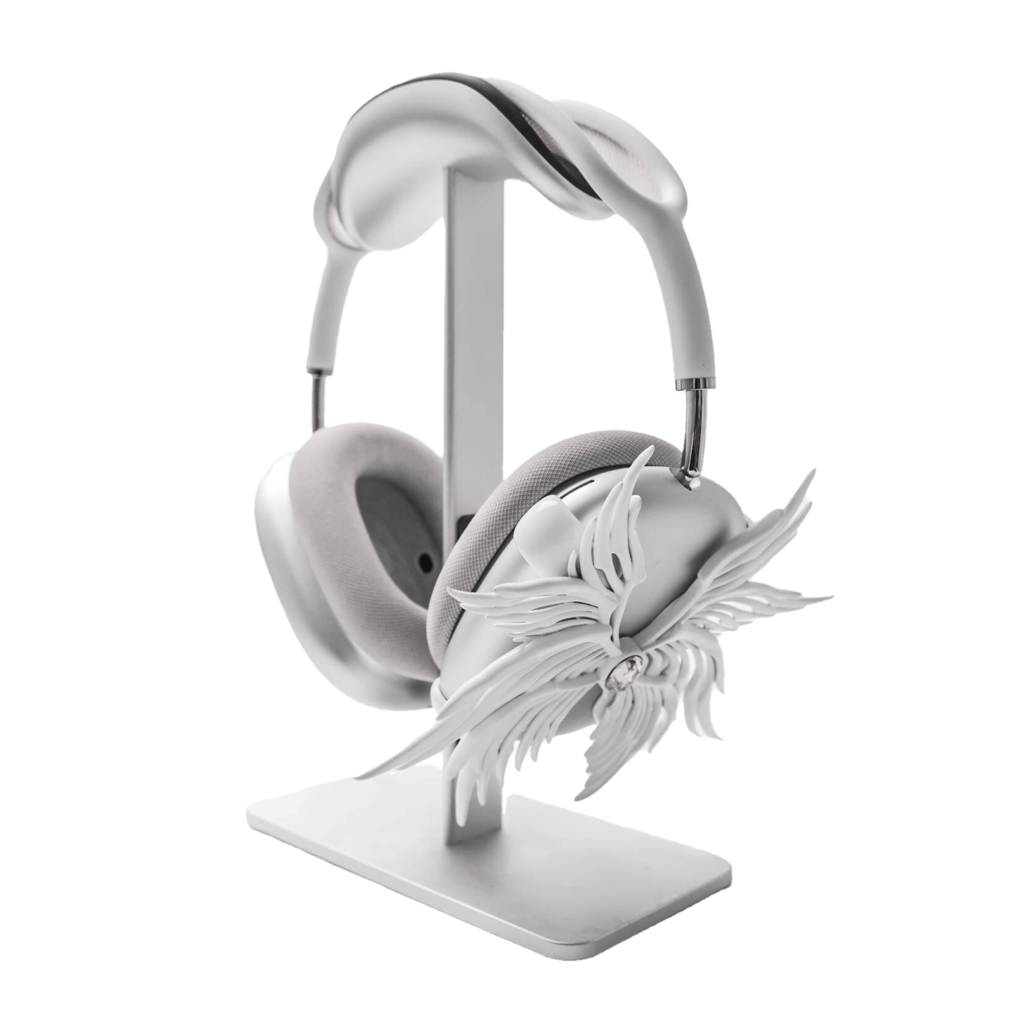 A high-fashion 3D attachment for AirPods Max headphones featuring layered, symmetrical Seraphim angel wings with a central white Swarovski crystal on each ear cup. Shown in two finish options: Reflective Silver Chrome and Matte Ethereal White.