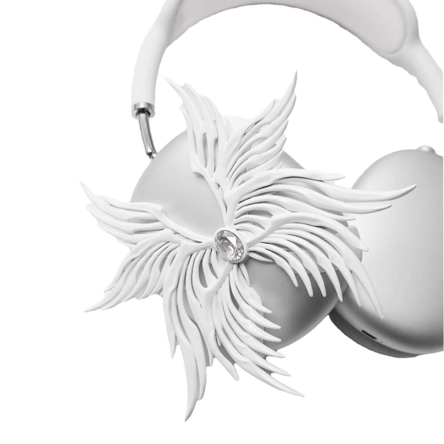 A high-fashion 3D attachment for AirPods Max headphones featuring layered, symmetrical Seraphim angel wings with a central white Swarovski crystal on each ear cup. Shown in two finish options: Reflective Silver Chrome and Matte Ethereal White.