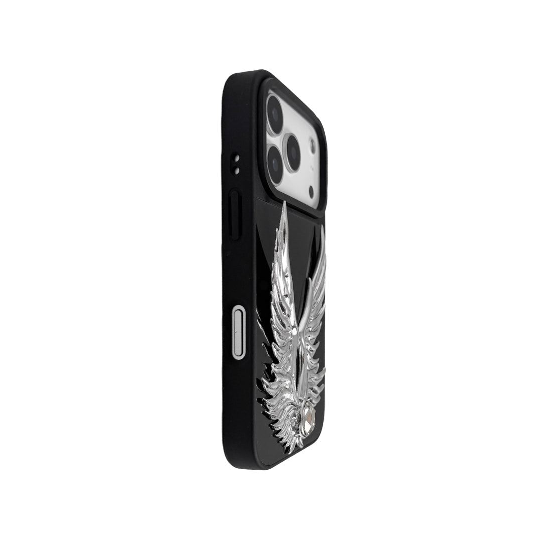 The Gem Silver Angel Wings iPhone Case featuring symmetrical 3D sculpted silver wings with a central rhinestone. Shown with both White and Black gem options, available on Silver, Transparent, and Black case bases.