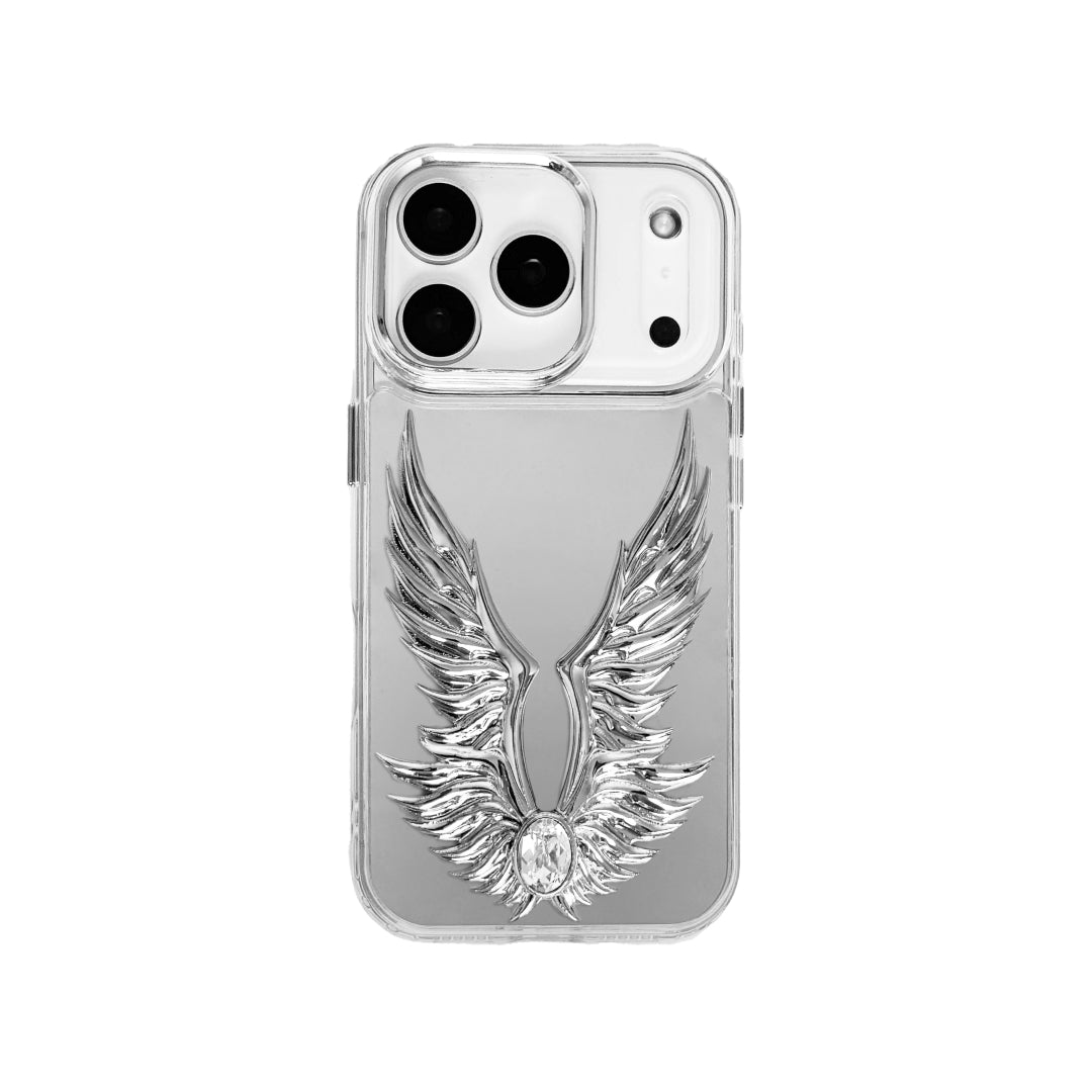 The Gem Silver Angel Wings iPhone Case featuring symmetrical 3D sculpted silver wings with a central rhinestone. Shown with both White and Black gem options, available on Silver, Transparent, and Black case bases.