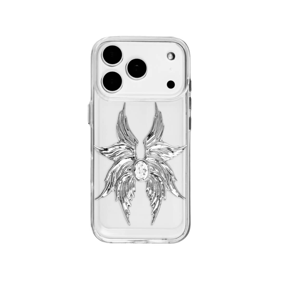 The Gem Silver Seraphim iPhone Case featuring 3D sculpted silver metallic wings with a central rhinestone. Shown with both White and Black gem options, available on Silver, Transparent, and Black case bases.
