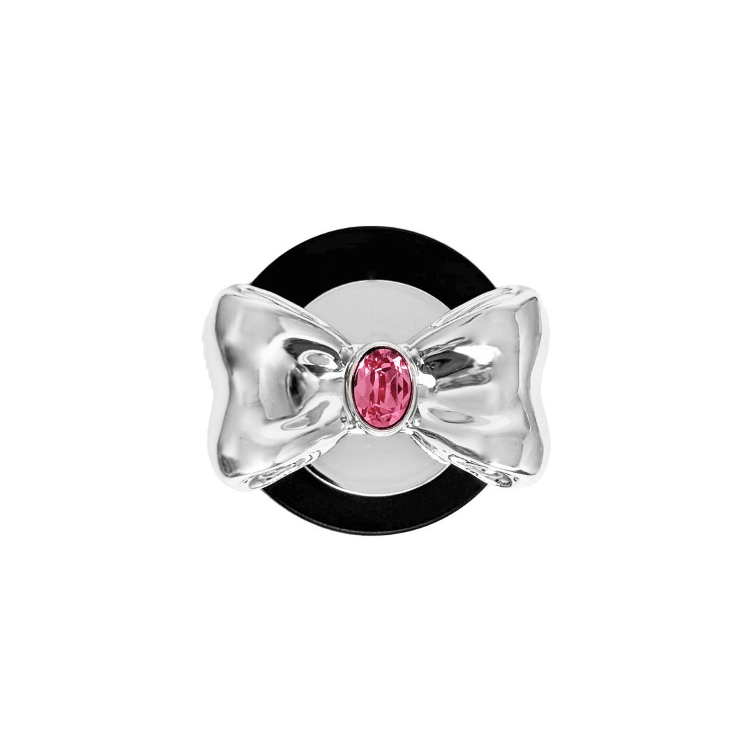 Gem Bow Phone Grip S available in silver, pink, black, and white bows, each featuring Swarovski crystal options: silver with pink, purple, white, blue, or black gems; pink with pink gem; black and white with black, white, or pink gems.