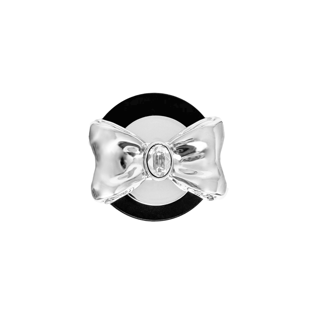 Gem Bow Phone Grip S available in silver, pink, black, and white bows, each featuring Swarovski crystal options: silver with pink, purple, white, blue, or black gems; pink with pink gem; black and white with black, white, or pink gems.