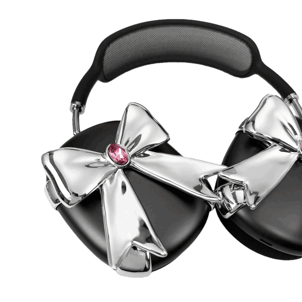 Glossy lilac AirPods Max cover with sculptural silver ribbon and gem detail – futuristic feminine tech accessory