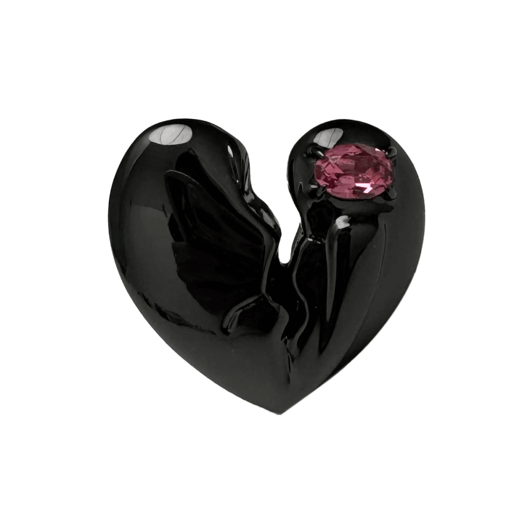 Slim band ring with a broken heart design and a pink Swarovski crystal centerpiece.