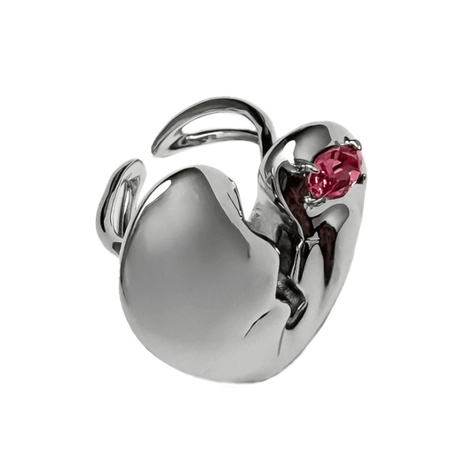 Slim band ring with a broken heart design and a pink Swarovski crystal centerpiece.