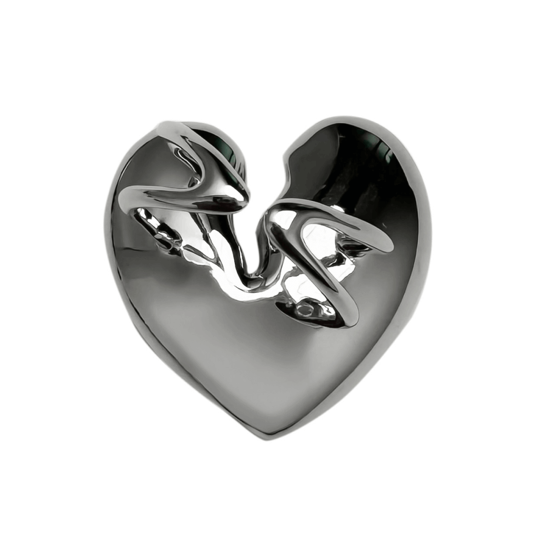 Slim band ring with a broken heart design and a pink Swarovski crystal centerpiece.