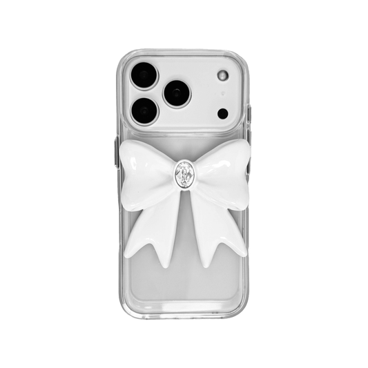Ivory Gem Bow iPhone Case with glossy white 3D bow and Swarovski crystal centerpiece, available in black, white, or pink gem colors.
