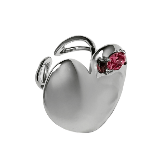 Slim band ring with a heart-shaped design and a pink Swarovski crystal centerpiece.