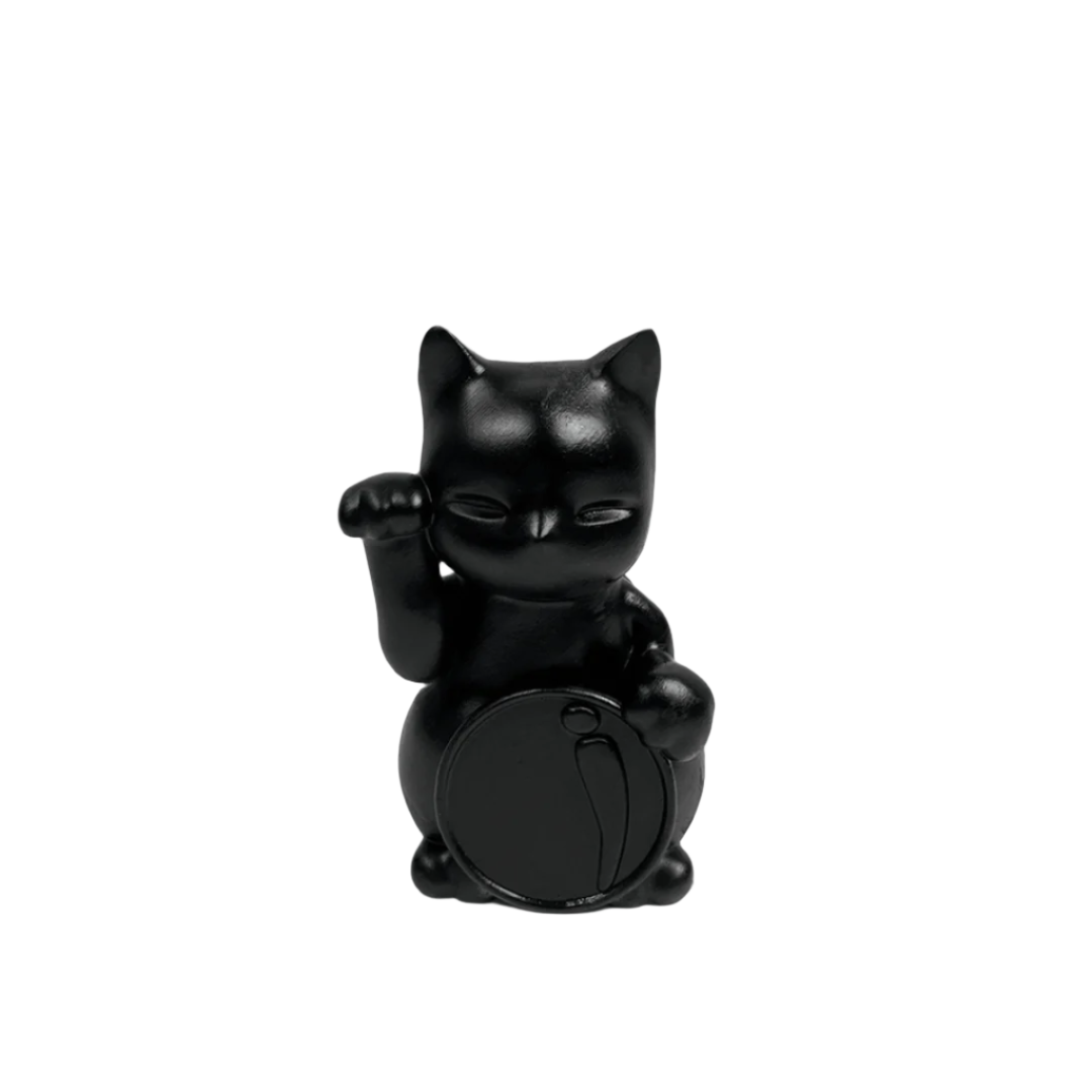 Futuristic chrome Maneki-neko sculpture – reflective silver lucky cat figure with raised paw and coin, blending traditional symbolism with modern minimalist form