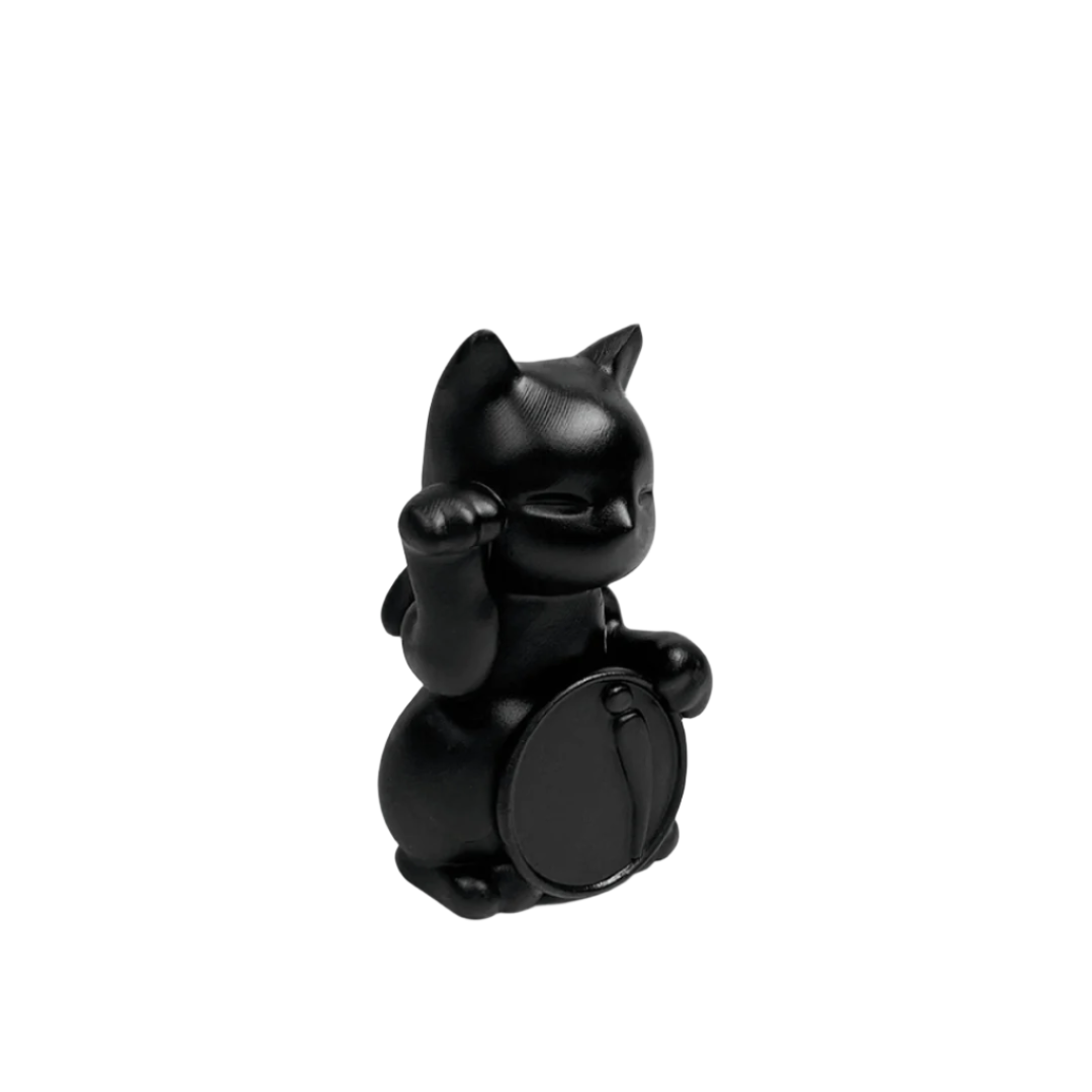 Futuristic chrome Maneki-neko sculpture – reflective silver lucky cat figure with raised paw and coin, blending traditional symbolism with modern minimalist form