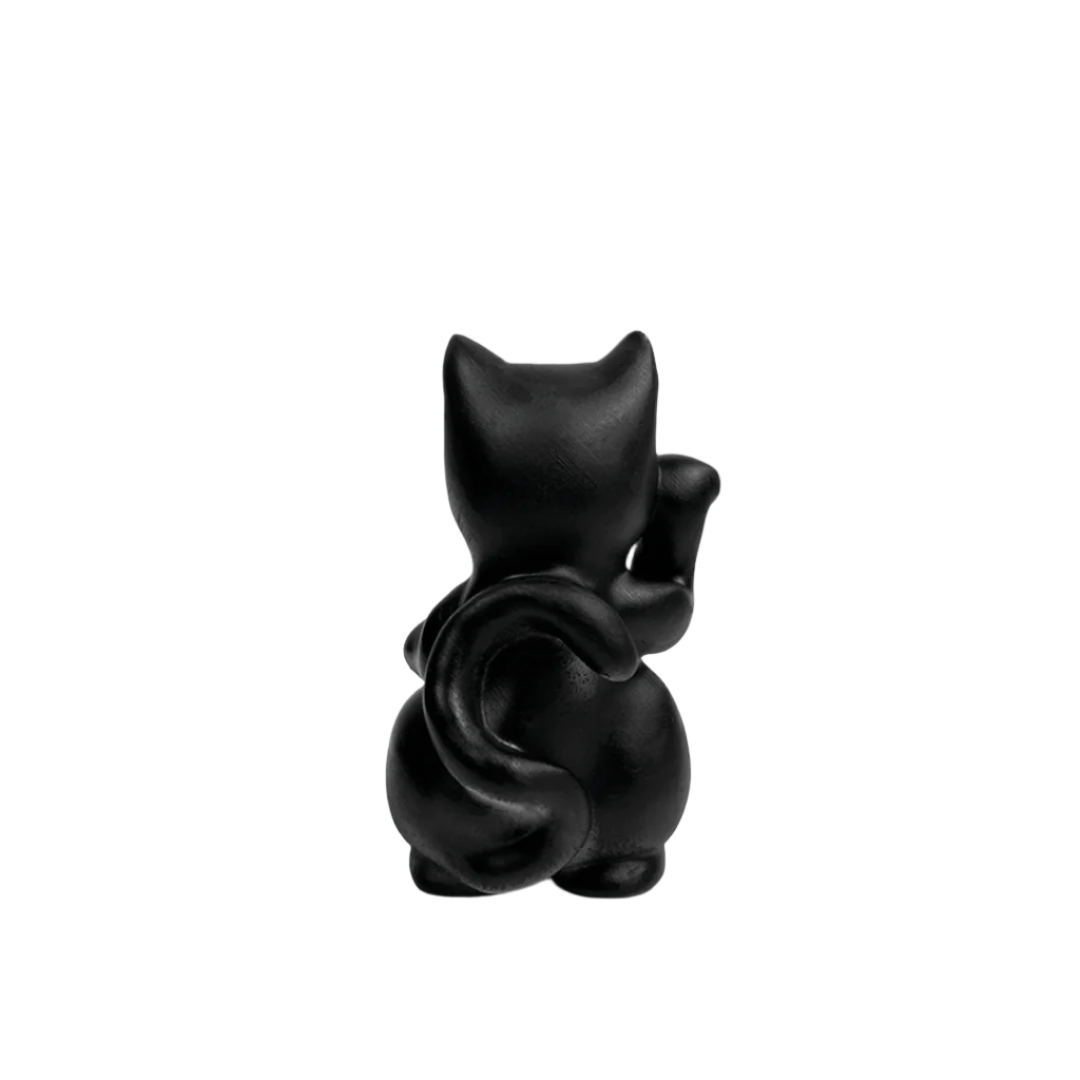 Futuristic chrome Maneki-neko sculpture – reflective silver lucky cat figure with raised paw and coin, blending traditional symbolism with modern minimalist form