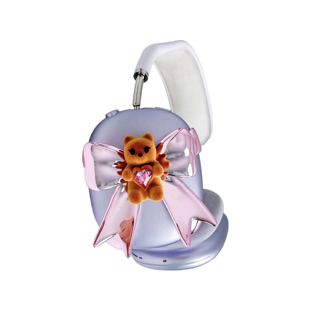 Pink bow AirPods Max cover featuring a beige bear holding a pink crystal heart, part of the Magic Bear series.