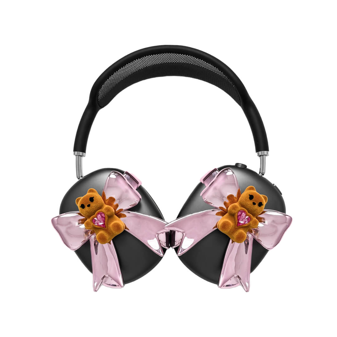 Pink bow AirPods Max cover featuring a beige bear holding a pink crystal heart, part of the Magic Bear series.