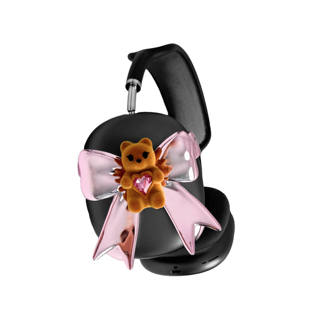 Pink bow AirPods Max cover featuring a beige bear holding a pink crystal heart, part of the Magic Bear series.