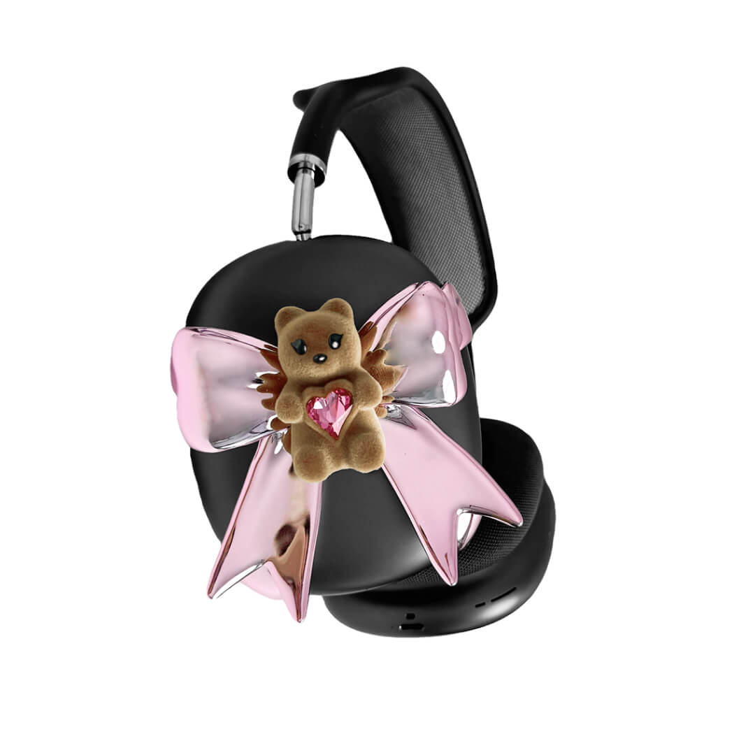 Pink bow AirPods Max cover featuring a beige bear holding a pink crystal heart, part of the Magic Bear series.