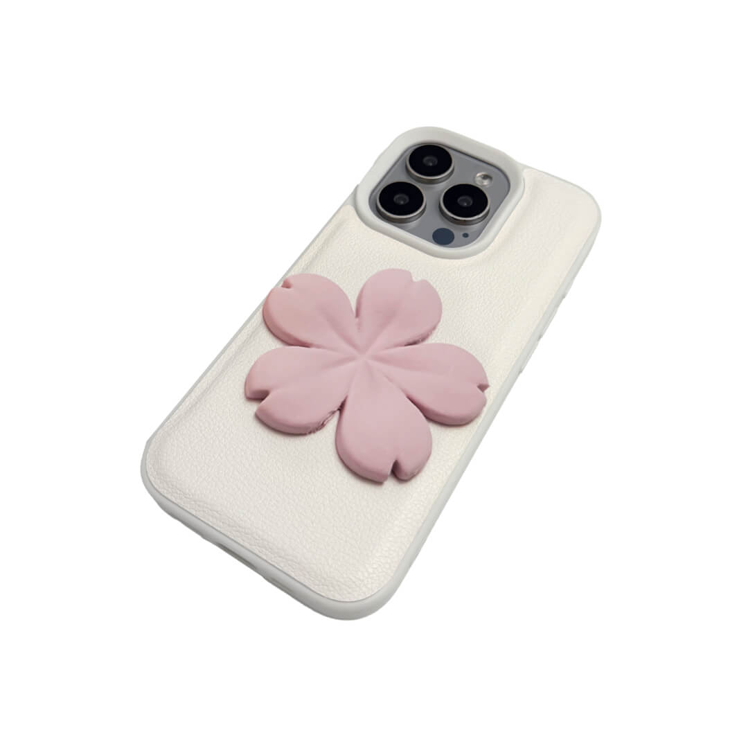 Matte Sakura iPhone Case collection showing three variants: Clear Case with Romantic Pink 3D Sakura, White Lychee Leather Case with Pure White 3D Sakura, and Clear Case with Blush Pink 3D Sakura. All feature the exclusive 3D printed floral relief design.