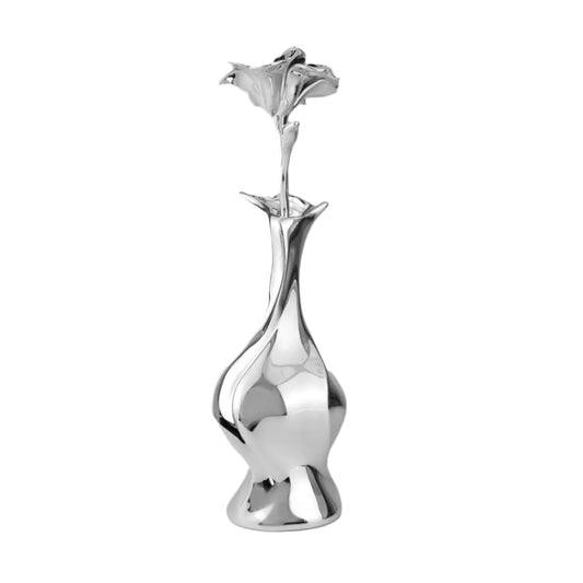 Futuristic chrome vase with fluid sculptural silhouette and blooming flower stem – high-shine metallic art object with organic elegance