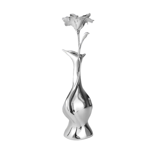 Futuristic chrome vase with fluid sculptural silhouette and blooming flower stem – high-shine metallic art object with organic elegance